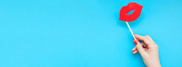 istock Red paper photo booth props female lips 1033931168