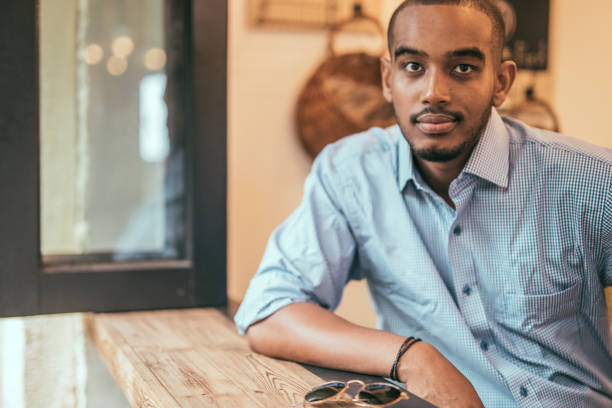 istock Man in coffee shop 1033945392