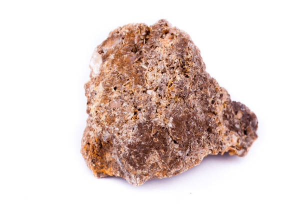 istock macro mineral stone wulfenite on a white background 1033949840