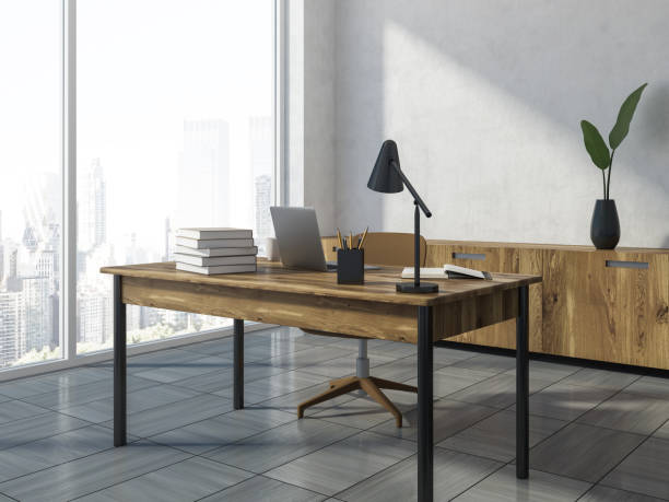 istock White and wooden loft office workplace corner 1033952150