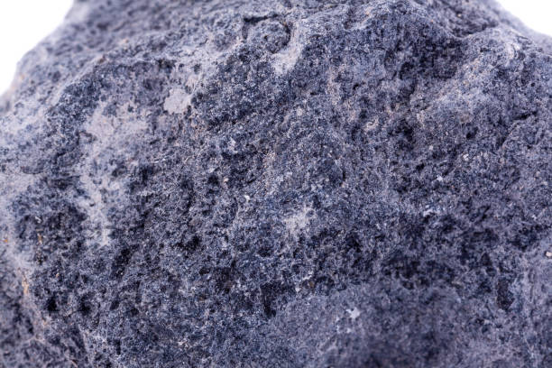 istock Macro mineral stone serpentine on a white background 1033957482