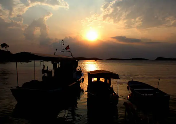 boats at sunset