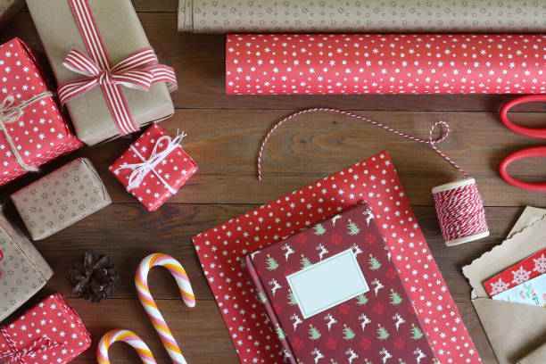 istock Packing Christmas book on the wooden table 1033960032