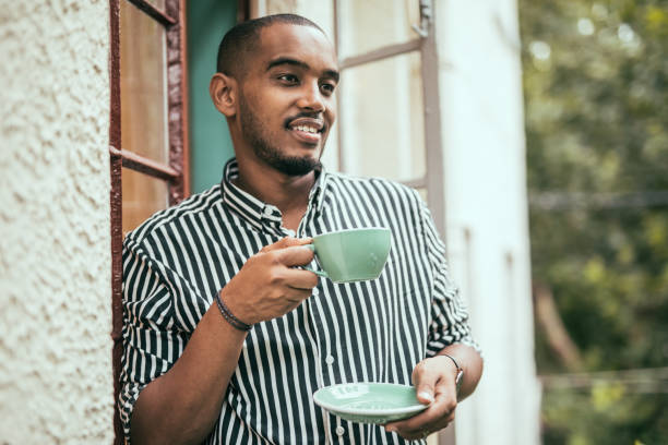 istock Handsome man in coffee shop 1033962554