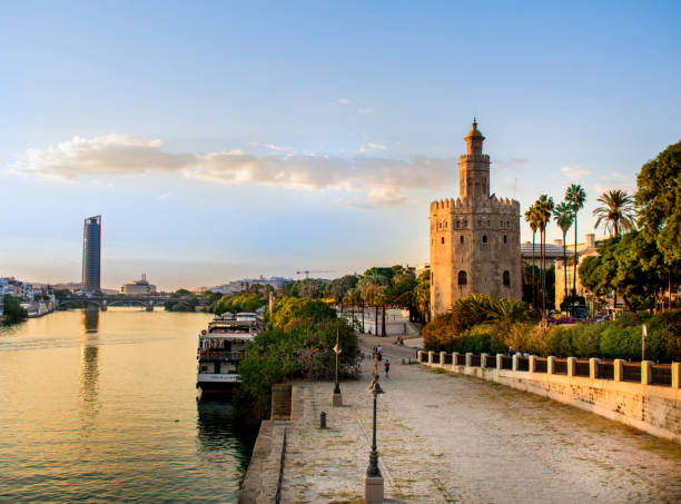 Tower of Gold Golden hour hitting the Torre del Oro in Seville seville photos stock pictures, royalty-free photos & images