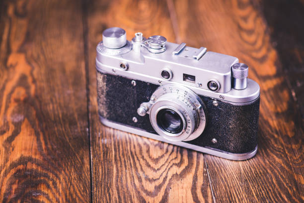 istock Old retro vintage camera. Vintage effect 1033964358