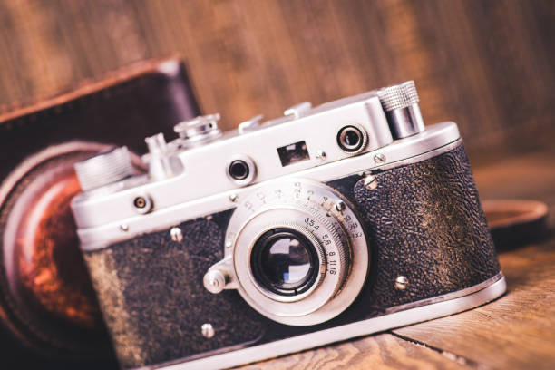 istock Old retro vintage camera. Vintage effect 1033965474