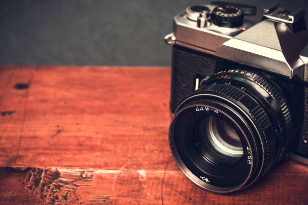 istock Old retro vintage camera. Vintage effect 1033965508