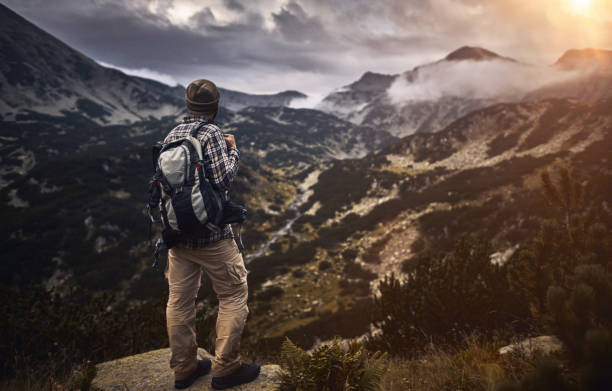 istock Traveling alone in the mountains at sunset 1033971336
