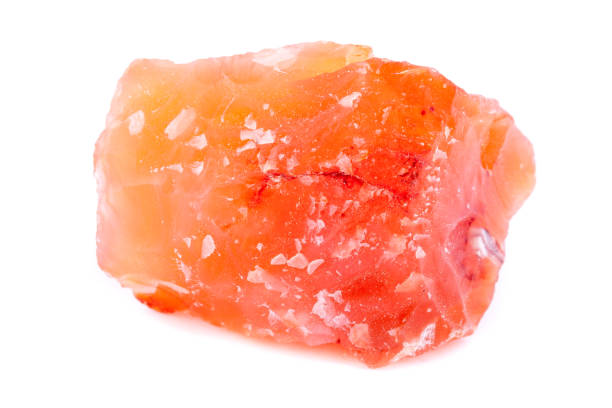 istock Macro mineral stone Carnelian on white background 1033987960