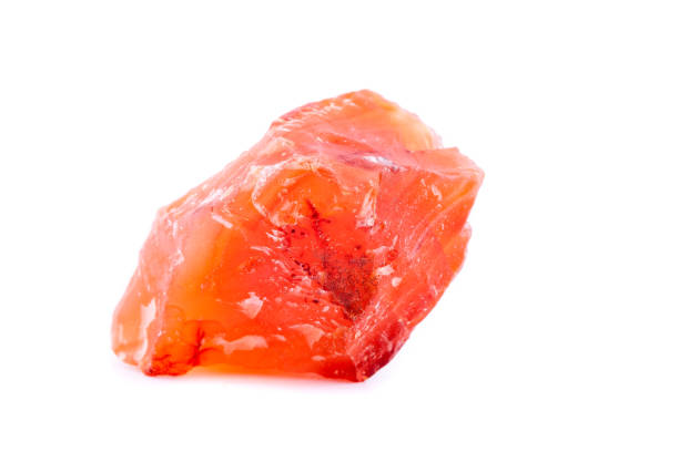 istock Macro mineral stone Carnelian on white background 1033988028