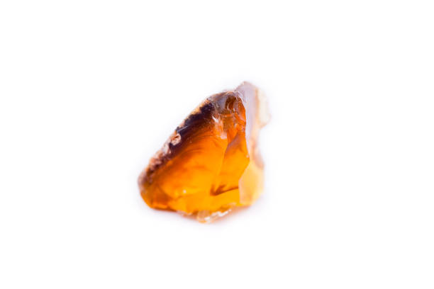 istock Macro mineral stone Fire opal on white background 1033988298