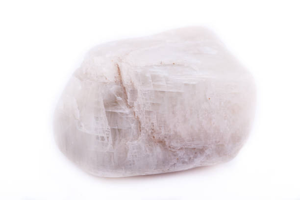 istock Macro mineral stone Moonstone isolated on white background 1033988316