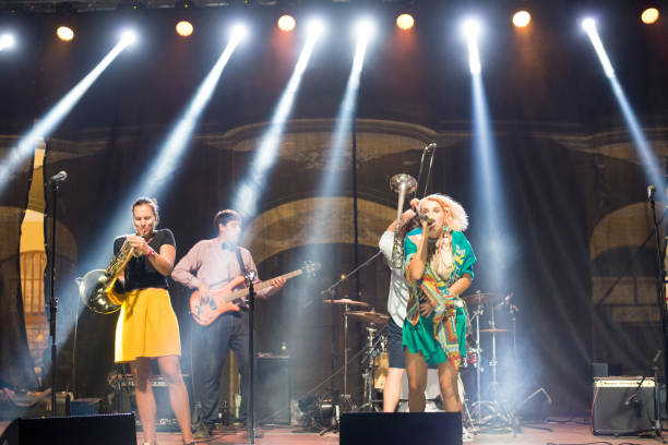 istock Rock band playing on the concert 1033988358
