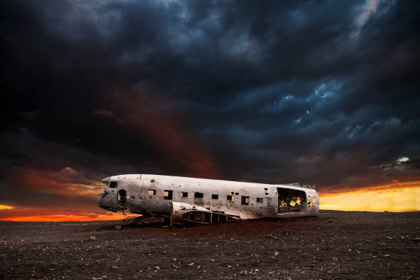 istock white wreck of a DC-3 airplane on the black beach 1034001338
