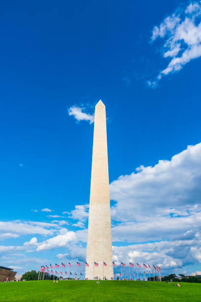 istock washington dc,Washington monument on sunny day with blue sky background. 1034017898