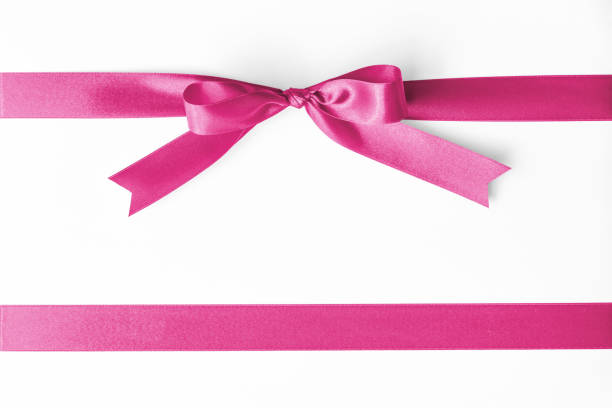 Pink satin ribbon stripe fabric bow isolated on white background with clipping path