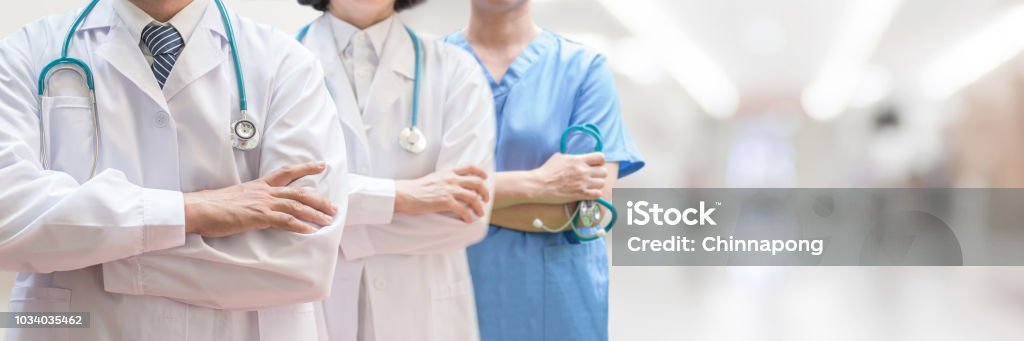 Doctor and surgeon professional team with medical clinic background for nursing care professional teamwork and patient trust in hospital ER and clinic concept Doctor Stock Photo