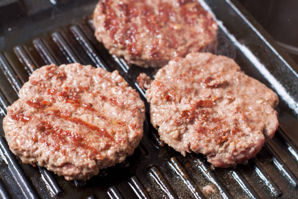 istock Preparation of homemade burger 1034036002
