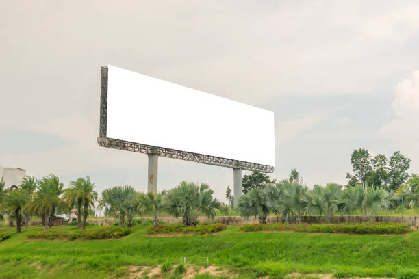 istock billboard blank on countryside road for advertising background 1034036356