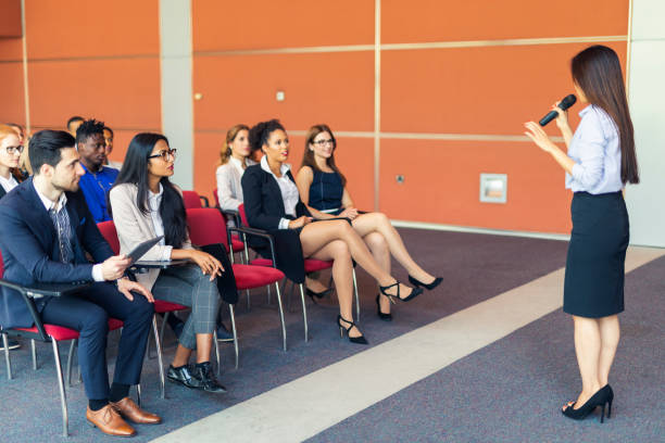 istock Female business presenter 1034039626