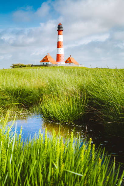 istock Westerheversand lighthouse, North Sea, Schleswig-Holstein, Germany 1034054788