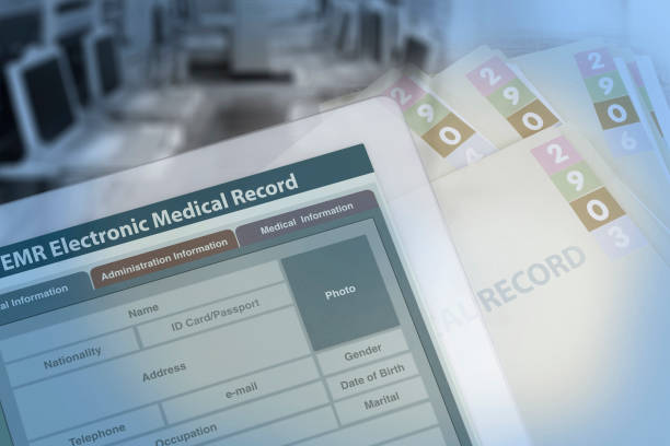 background photo showing medical record changing from paperwork to electronic medical record. - medical record imagens e fotografias de stock