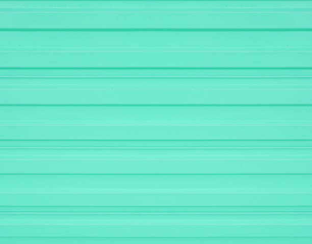 Turquoise corrugated metal wall textured