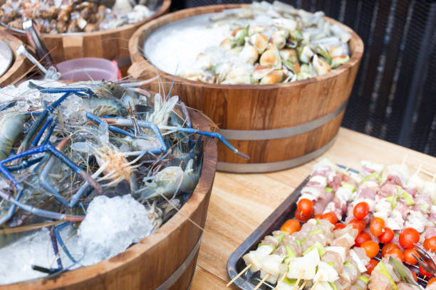 istock shrimp and seafood and barbeque for customer 1034086296