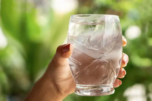 https://media.istockphoto.com/id/1034103040/photo/woman-hand-holding-glass-of-cold-and-fresh-water-with-ice.webp?b=1&s=170667a&w=0&k=20&c=Fuc584IW9iad4QfoRuo1v7q2jHZ1SqCSobx2oTn3A-o=