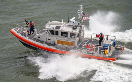A United States Coast Guard patrol boat keeps watch along the Cooper River, in Charleston, SC, USA.\n\nSeptember 3, 2018.