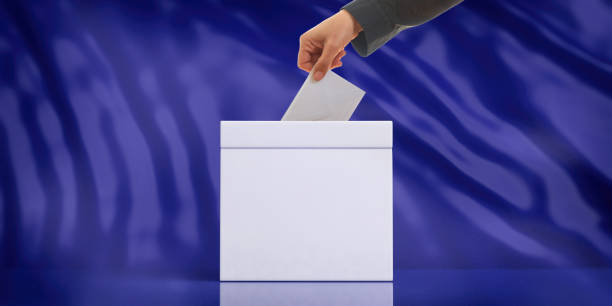 istock Hand inserting an envelope in a white blank ballot box on blue abstract background, copy space. 3d illustration 1034134860