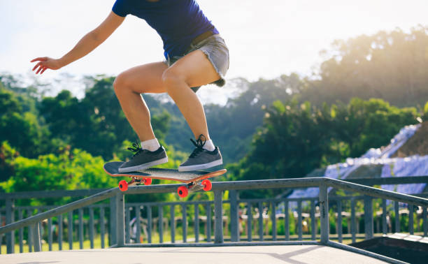 istock Skateboarder jumping in the skatepark 1034140612