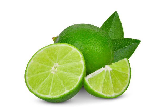 istock whole and slices green lime with green leaf isolated on white background 1034140644
