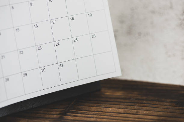 istock Calendar on wood table, vintage style. 1034148636