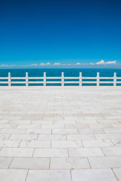istock Sidewalk ground and Qinghai Lake 1034162924