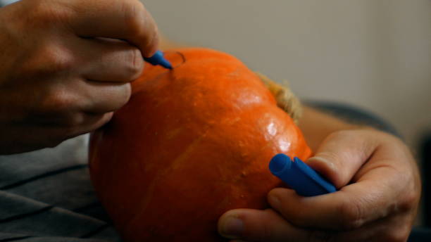 istock draw halloween pumpkin ready to carving 1034171718