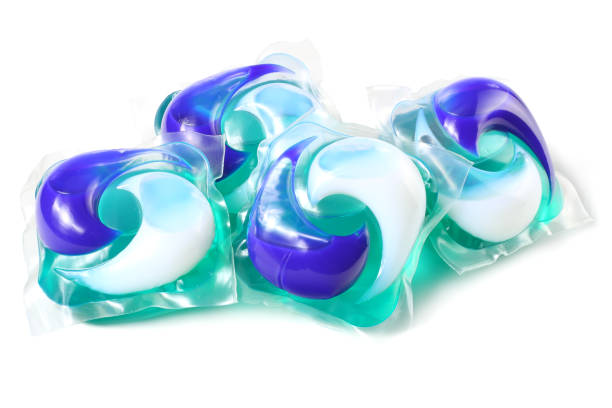 istock Washing detergent capsule pod isolated on white background 1034180672