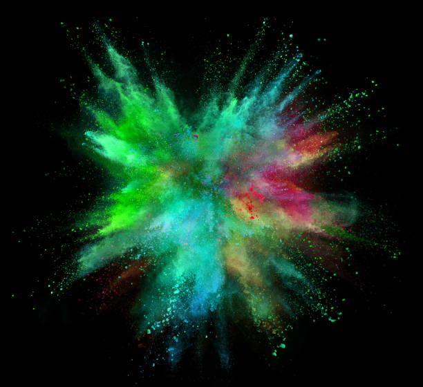 istock Explosion of coloured powder isolated on black background. 1034187280