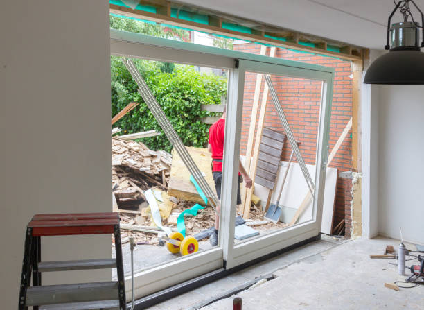 istock Removing a wall and placing a glass sliding door 1034187296