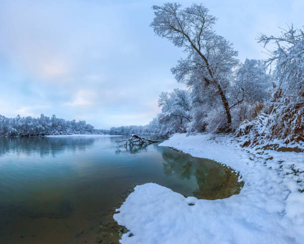 istock Snowfall on the river. The River Terek in the North Caucasus. 1034187344