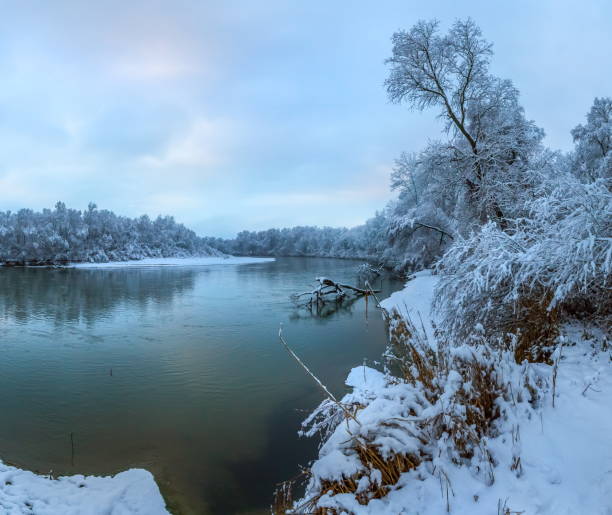 istock Snowfall on the river. The River Terek in the North Caucasus. 1034187726