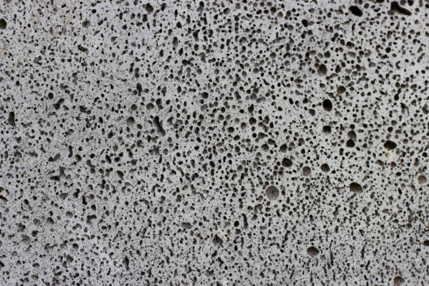istock dark gray porous concrete close-up, texture, background 1034191910