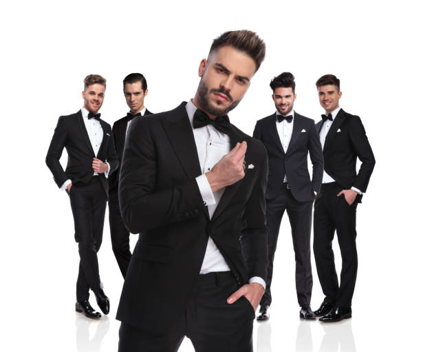 istock five elegant groomsmen standing with arrogant leader in front 1034207624