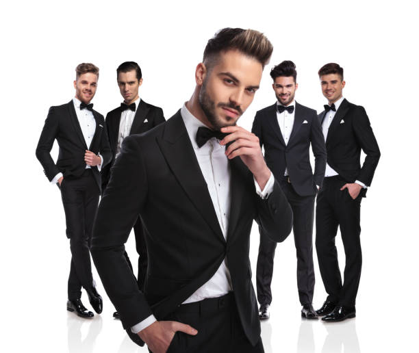 istock handsome groom with beard stands in front of group thinking 1034207646