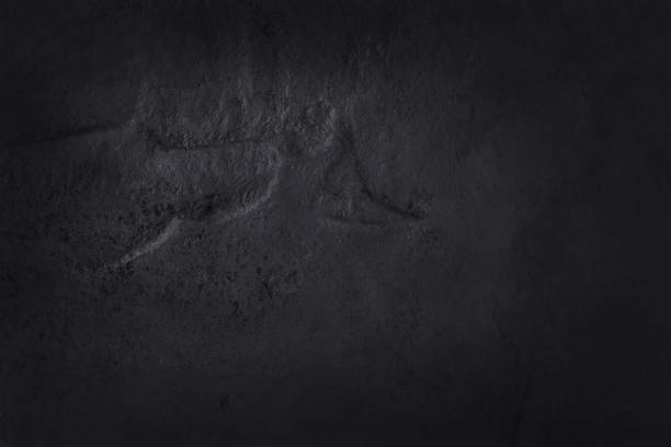 istock Dark grey black slate texture in natural pattern with high resolution for background and design art work. Black stone wall. 1034211510