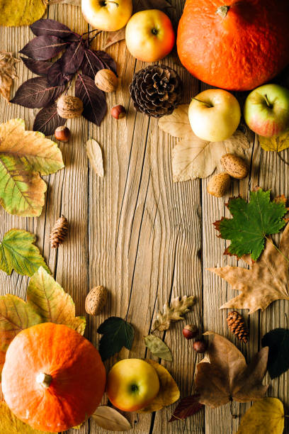 istock Golden Autumn, wooden background, frame 1034224760