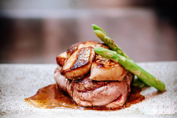istock Fillet mignon steak with Foie Gras and spring asparagus 1034232086