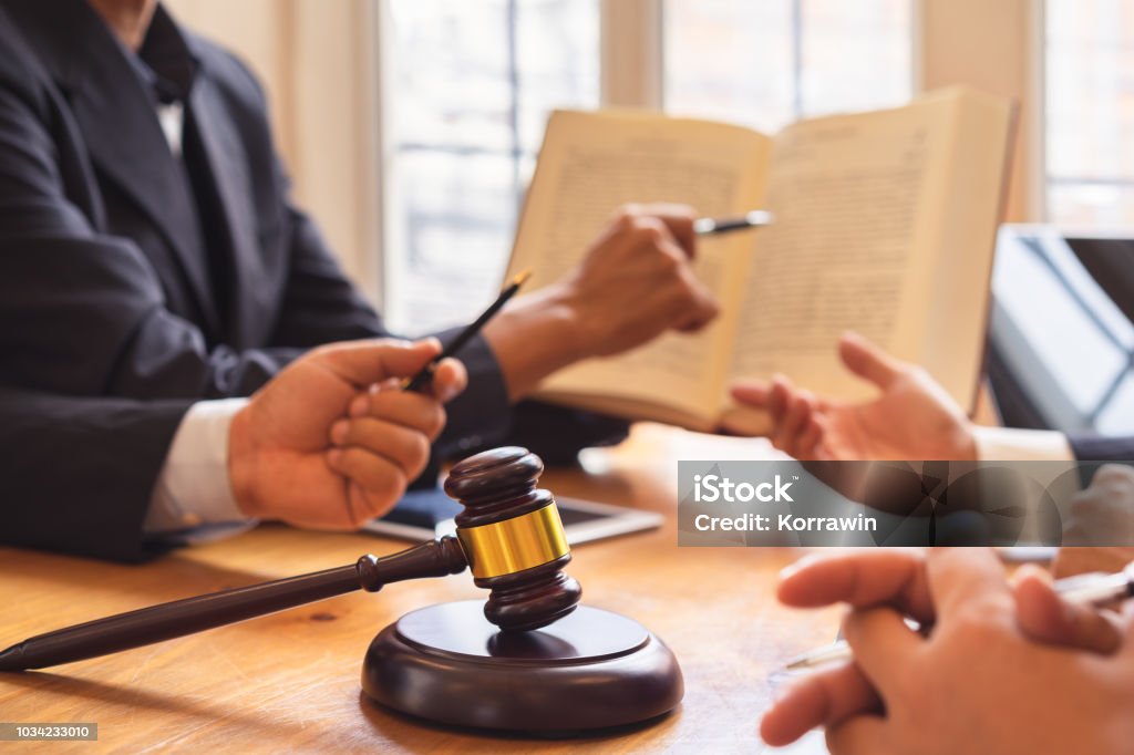 Business people and lawyer or judge team discussing Co-Investment Conference, Concepts of law, advice, legal services. Lawyer Stock Photo