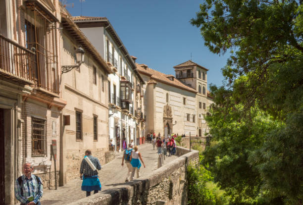 Old houses (facade) along the Carrera del Darro in the historic centre of Granada, Spain